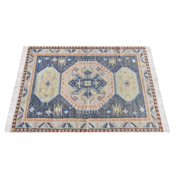 Harbour flatweave navy wool and hemp kilim rug with gold and rust medallions, in an entryway