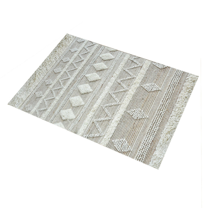 Barley handwoven hemp and wool rug with raised ivory diamonds on cream, in a living room