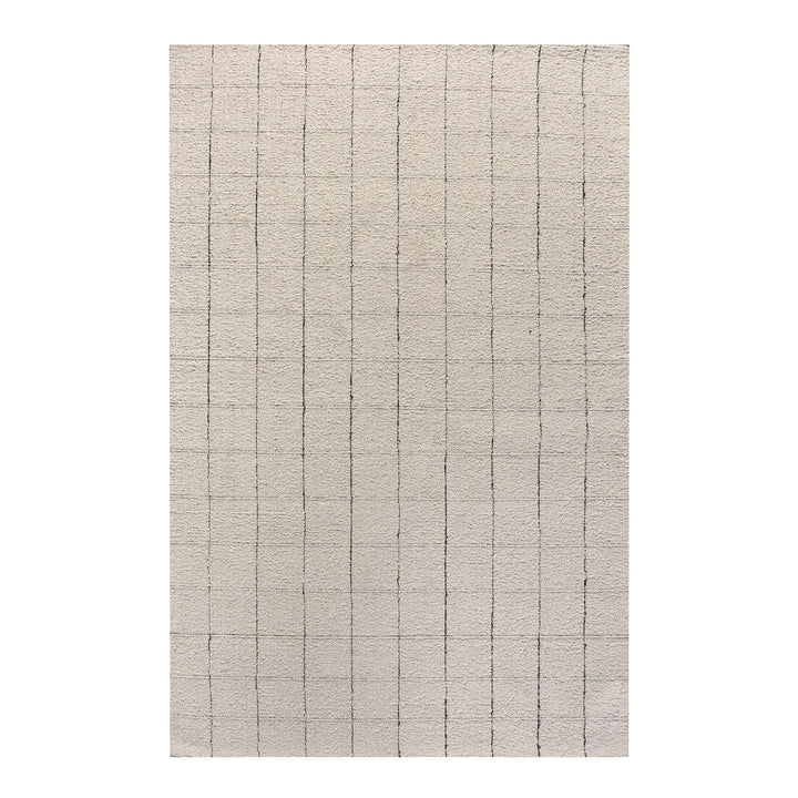 Khidki handwoven wool flatweave rug with fine charcoal grid lines on ivory, in a living room