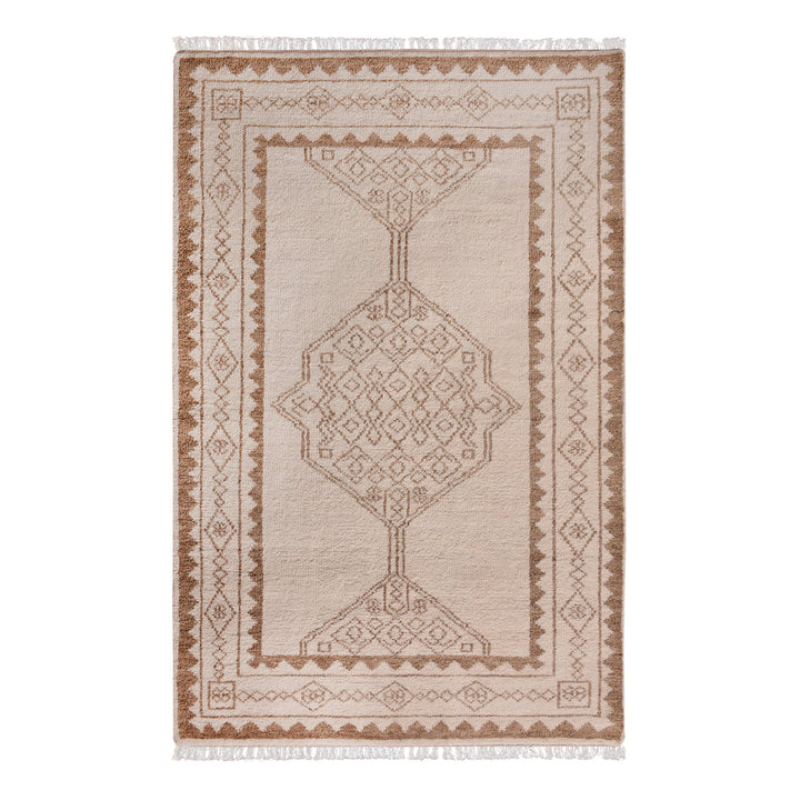 Gulab hand-knotted NZ wool rug with a blush medallion on an ivory field, in a bedroom