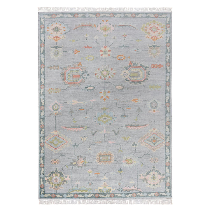 Purana hand-knotted wool rug with faded Oushak florals in slate blue-grey, rose, sage and gold