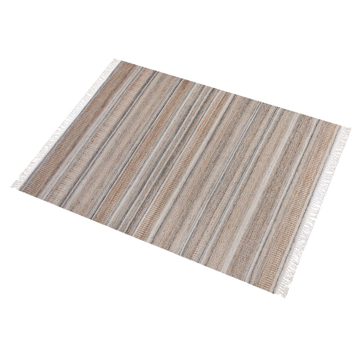 Deckchair handwoven jute and wool rug with broad ivory and tan stripes, in a living room