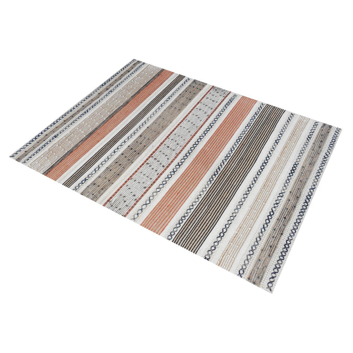 Bunting handwoven hemp and wool rug with horizontal rust, charcoal and ivory stripes, in a study
