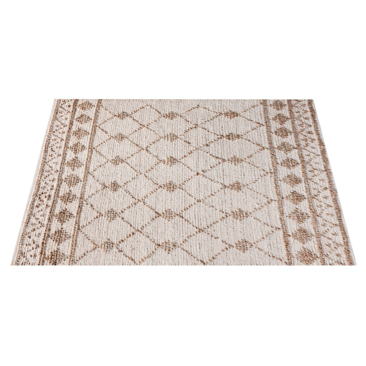 Driftwood handwoven jute rug with natural and grey diamond lattice, in a living room