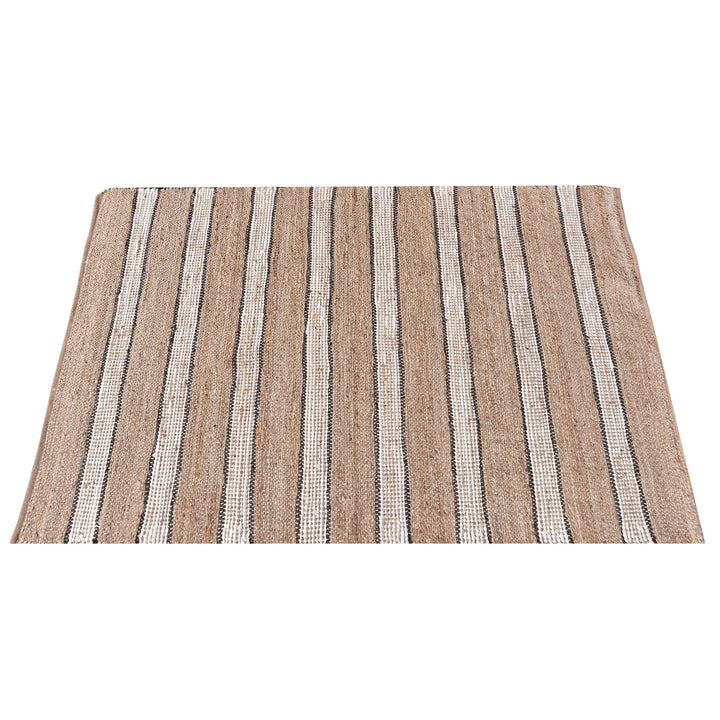 Hessian handwoven hemp and leather rug with ivory stripes on tan, in a dining room