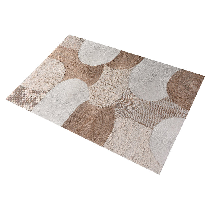 Boond handwoven wool, hemp and cotton rug with overlapping ivory and tan circles, in a bedroom