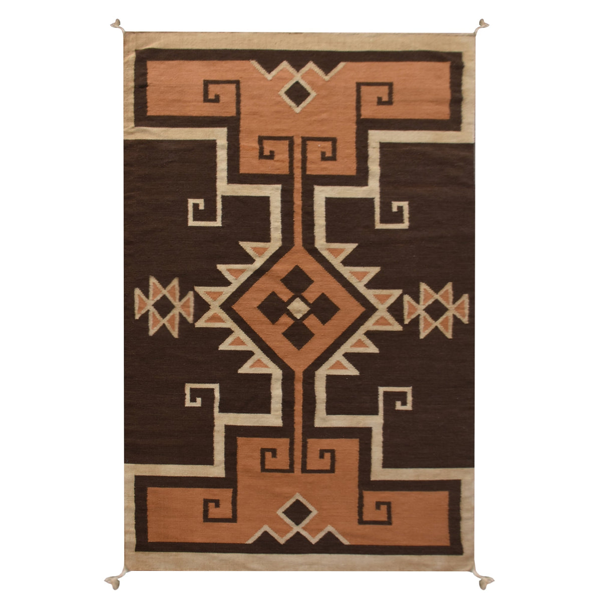 Ember flatweave New Zealand wool rug with rust and cream Southwestern diamonds, in an entryway