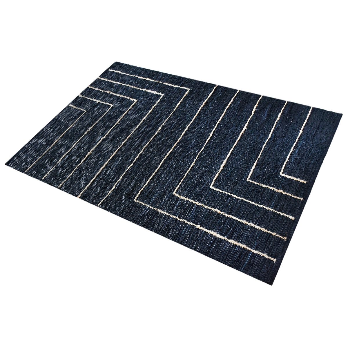 Aasmaan handwoven hemp and leather rug with cream nested angles on midnight navy, in a study