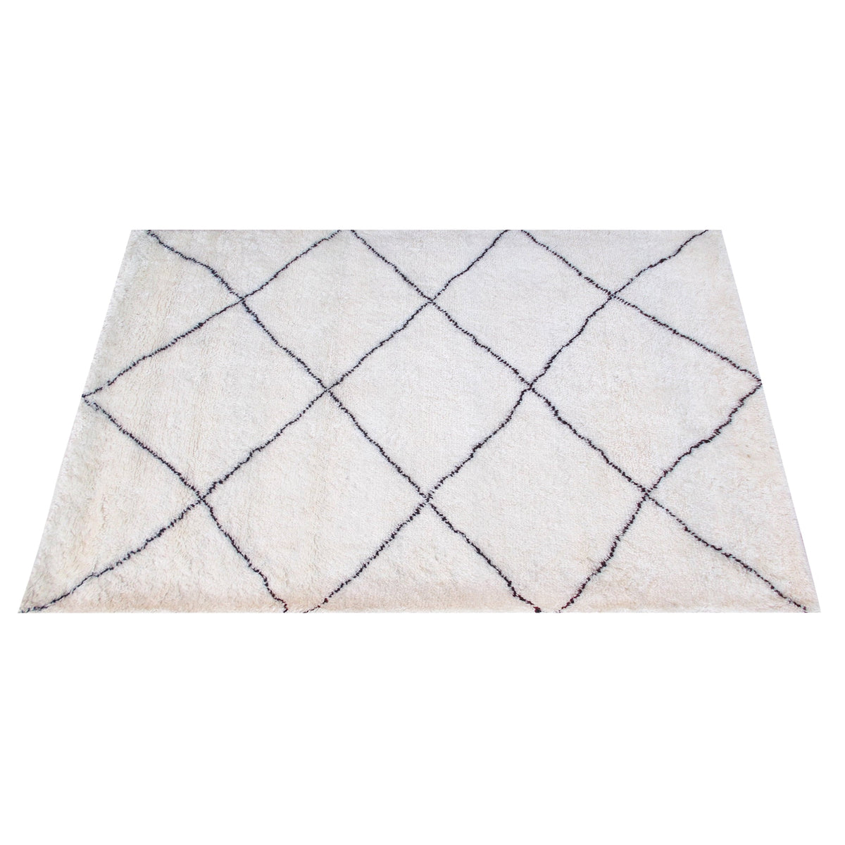 Snowfield handwoven wool rug with fine charcoal diamond lattice on ivory, in a study