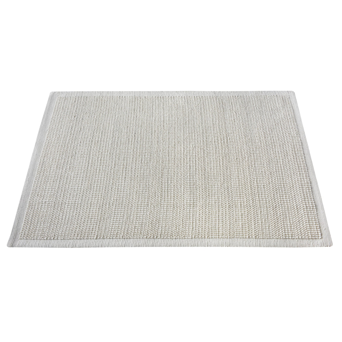 Basket handwoven cream wool rug with basketweave texture and tonal border, in a bedroom
