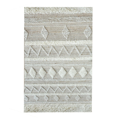 Barley handwoven hemp and wool rug with raised ivory diamonds on cream, in a living room