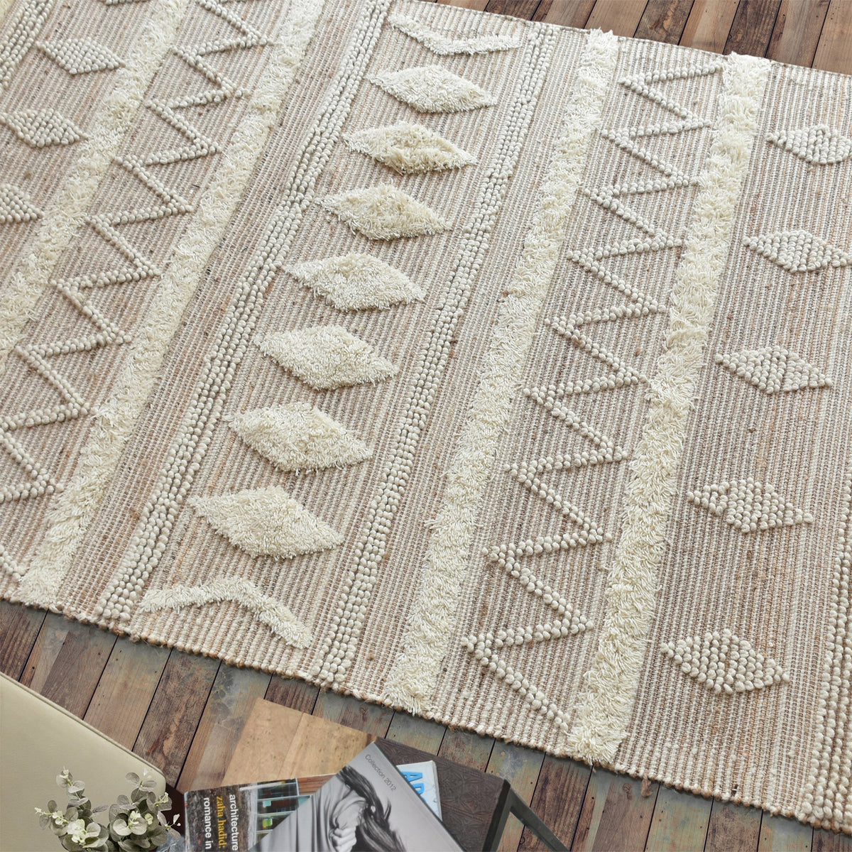 Barley handwoven hemp and wool rug with raised ivory diamonds on cream, in a living room