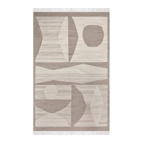Chhatri handwoven wool rug with bold ivory and beige arch blocks, in a living room