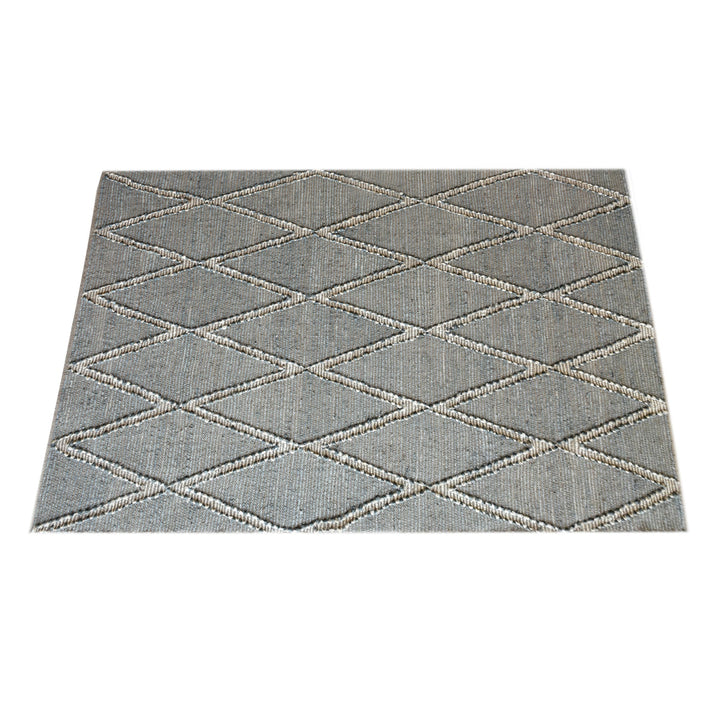Thyme handwoven hemp rug with an ivory diamond lattice on sage grey, in a dining room