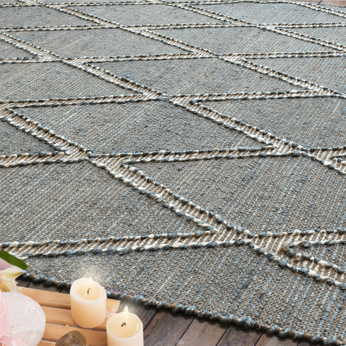 Thyme handwoven hemp rug with an ivory diamond lattice on sage grey, in a dining room