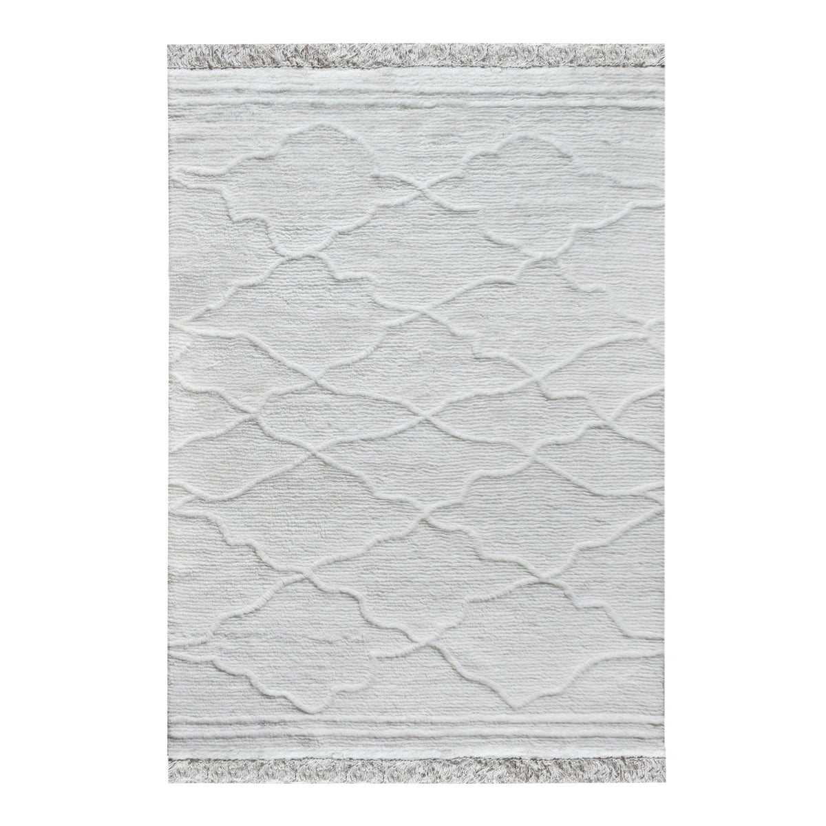 Kangan tufted wool rug with a tonal carved Moroccan lattice in bone ivory, in a bedroom