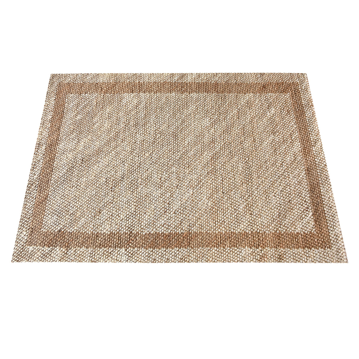 Chaukhat handwoven flatweave jute and wool rug in jute tan with a rust-brown border, in a living room