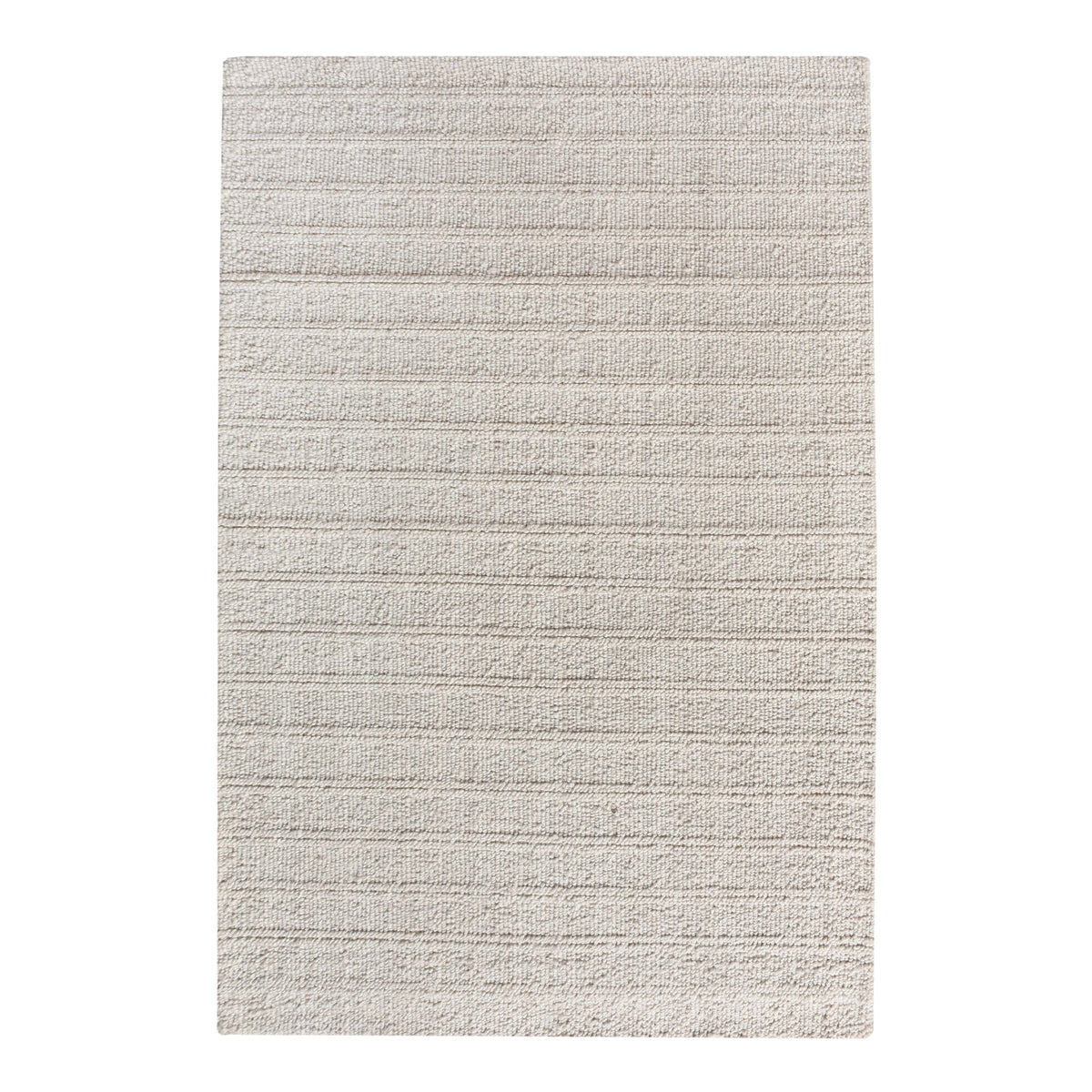Oon handwoven ribbed wool rug in undyed oatmeal with horizontal ribs, under a coffee table
