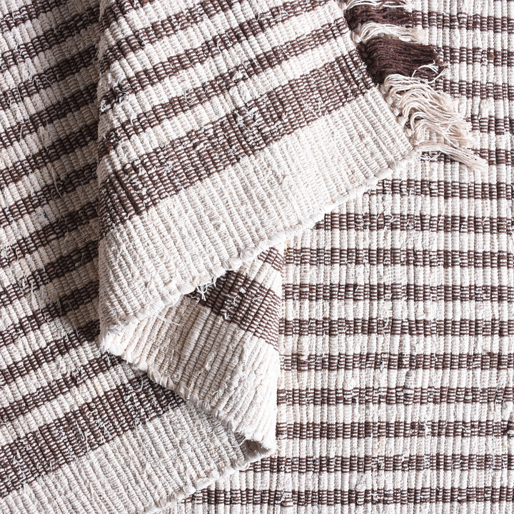 Dari handwoven recycled denim and cotton flatweave rug with fine ivory and taupe stripes and fringed ends