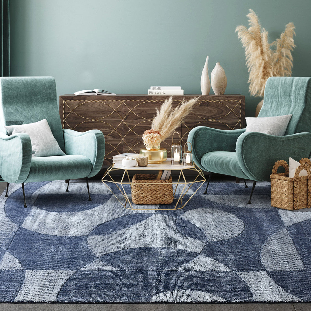 Mauj handwoven viscose and PET rug with denim blue overlapping circles on grey, in a living room