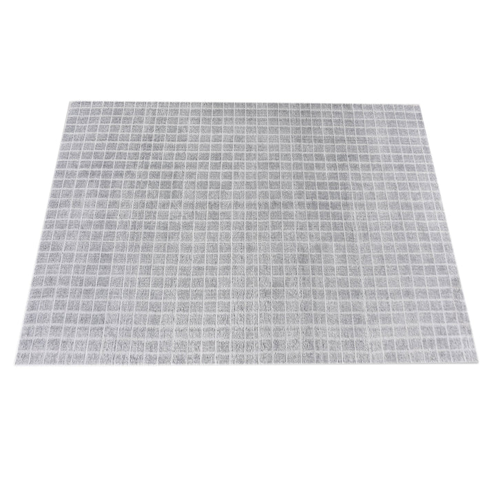 Baramda hand-loomed recycled PET rug with fine white grid lines on pale grey, on a verandah