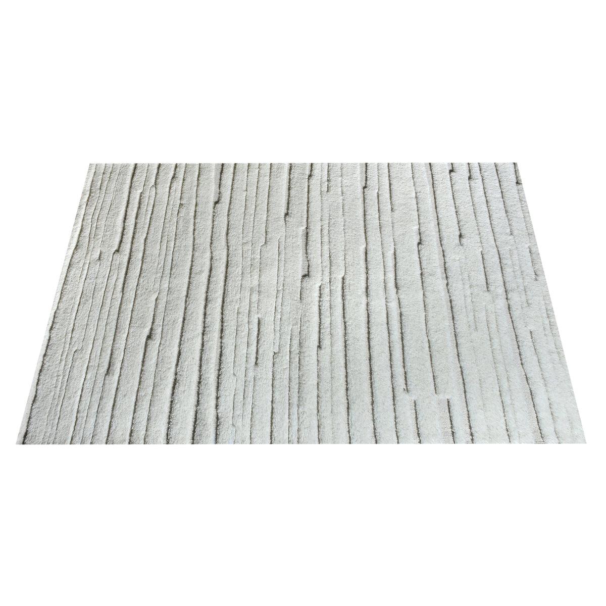 Bark handwoven ivory wool rug with carved vertical ridges, in a living room