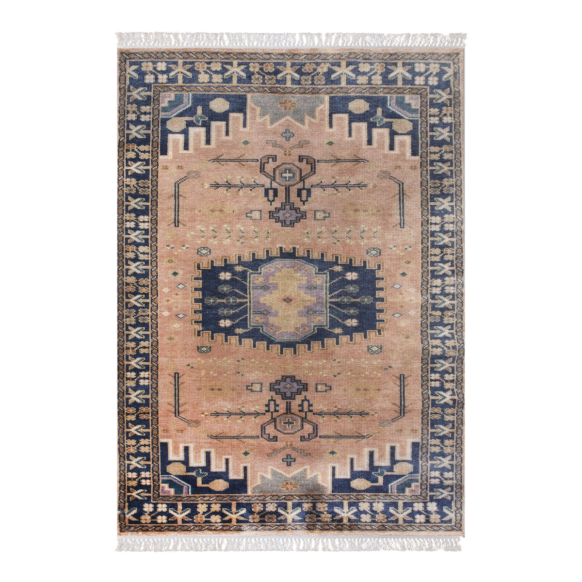 Darbar hand-knotted wool rug with rust and navy Anatolian medallions, in a living room