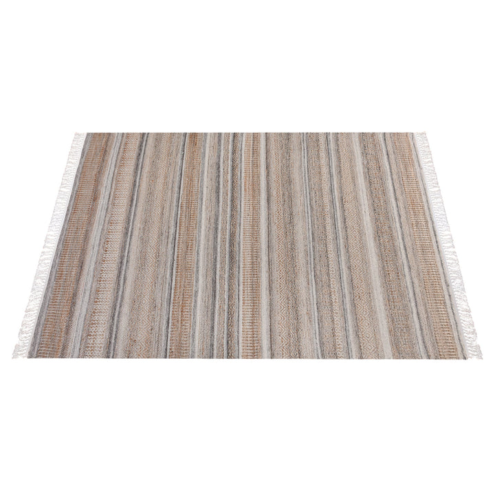 Deckchair handwoven jute and wool rug with broad ivory and tan stripes, in a living room