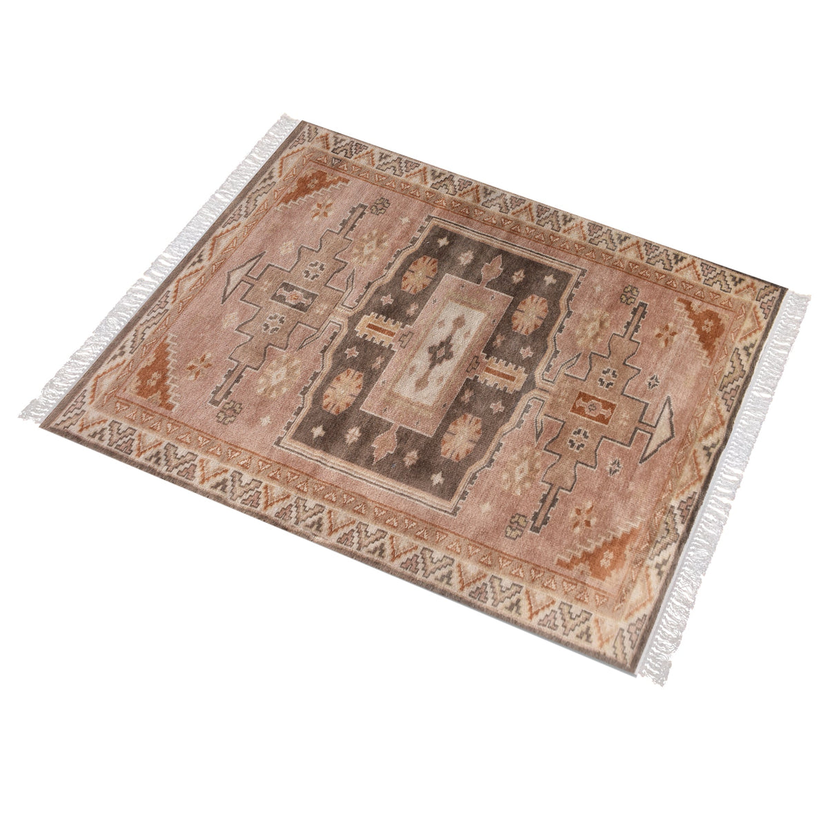 Matka hand-knotted wool rug with a faded terracotta Persian medallion, navy and brown, in a bedroom