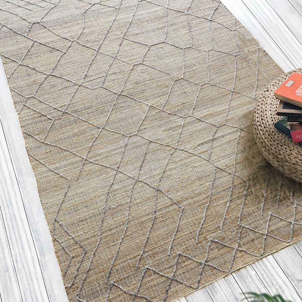 Trellis handwoven hemp and wool rug with fine diamond lattice on natural, in a living room