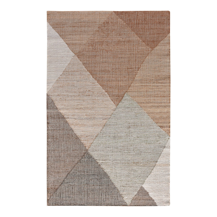 Patang handwoven jute flatweave rug with large blush, tan and grey diamonds, in a bedroom