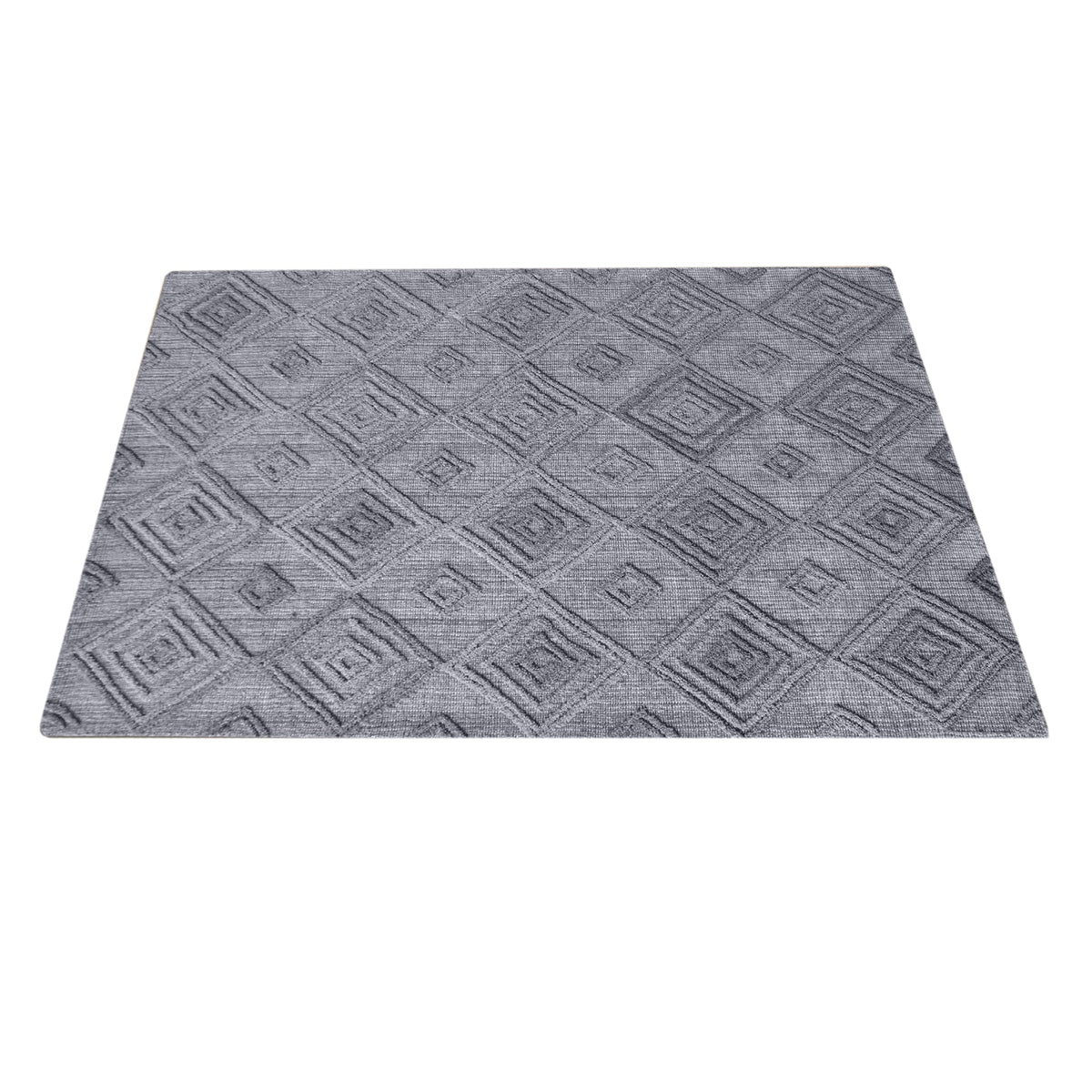 Jaali handwoven oatmeal wool rug with raised ivory diamond lattice, in a living room